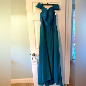 Long formal dress with stays made for large bosom. Never worn
